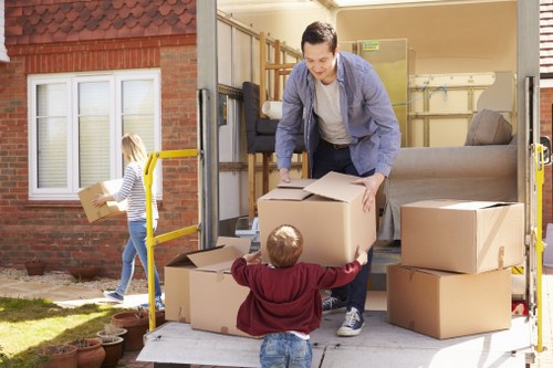 Removal team preparing a move in a Westhampstead street
