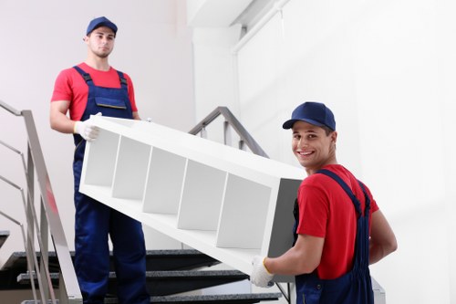 Professional movers loading furniture for a local Westhampstead relocation
