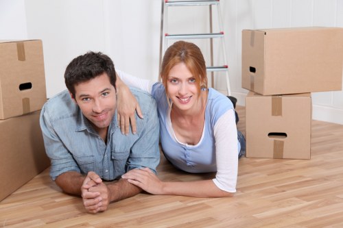 Removal team planning a residential move on a Westhampstead street