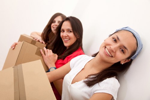 Cardboard and furniture items prepared for recycling and charity donation