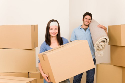 Loading furniture and boxes into a removals van in West Hampstead