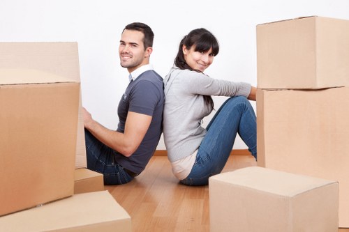 Packed furniture and boxes prepared for transport by movers