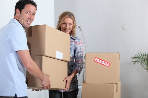 Packed office furniture and equipment ready for a business move