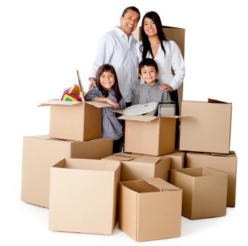 Removal team handling furniture and boxes during a home move in West Hampstead